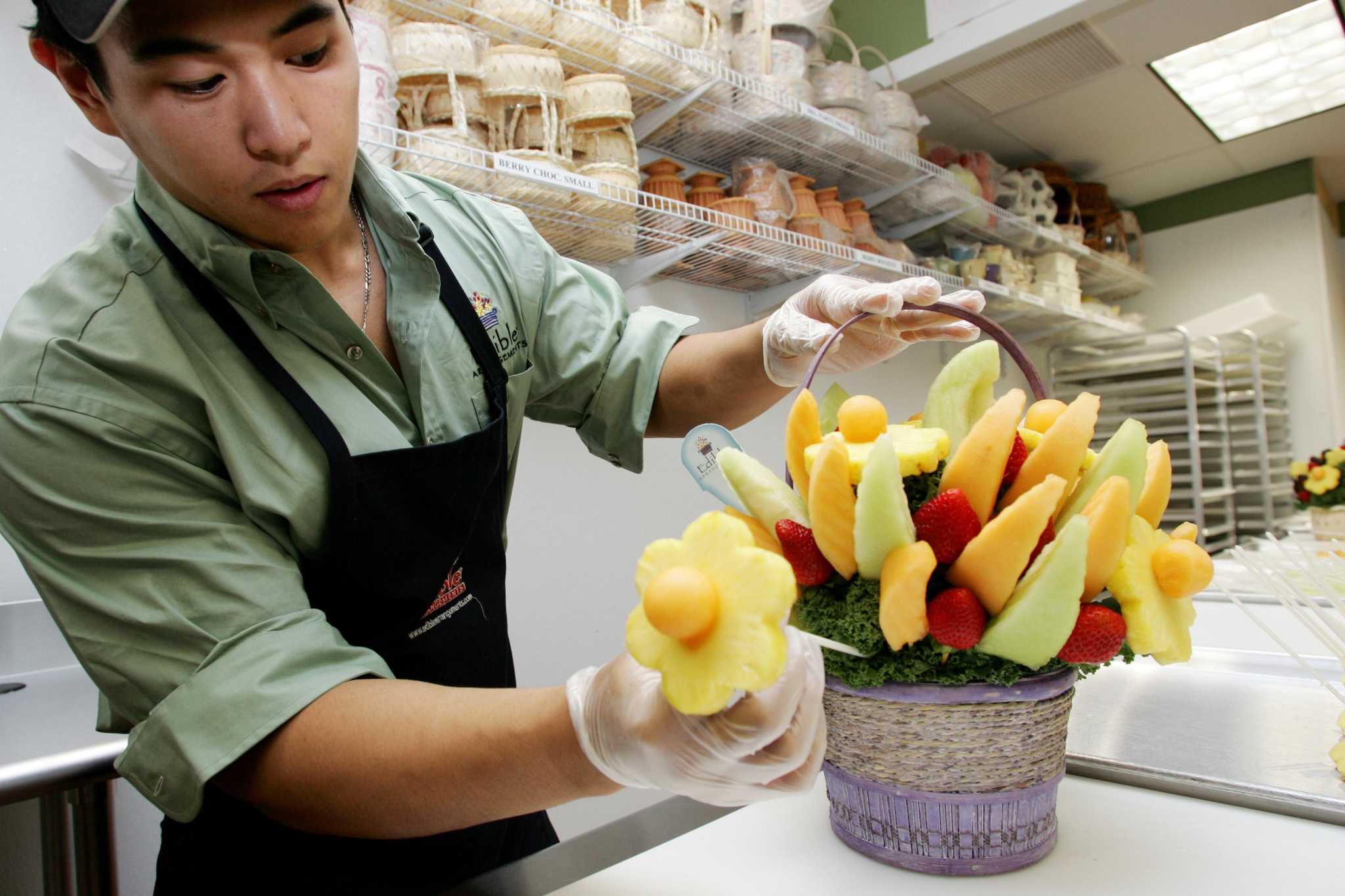 Edible Arrangements CEO buys back equity from Greenwich firm