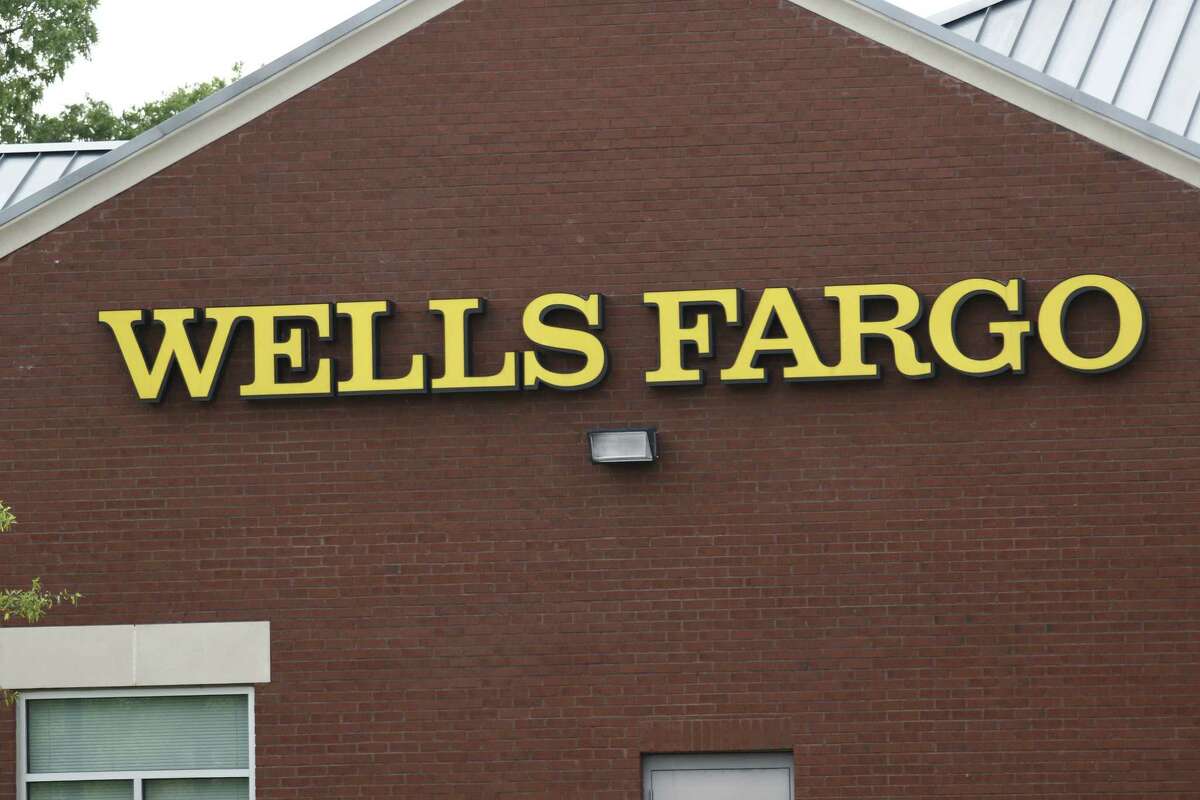 The Federal Reserve and Federal Deposit Insurance Corp. said Monday that Wells Fargo had addressed concerns they raised after the bank became the first to have its so-called living will found “not credible” two times running.