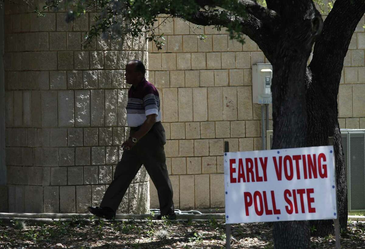 A voter arrives at the polling site at Brook Hollow Library on April 24. Early voting continues through May 2, except for April 28 and 30, when the polls are closed. The election is May 6.