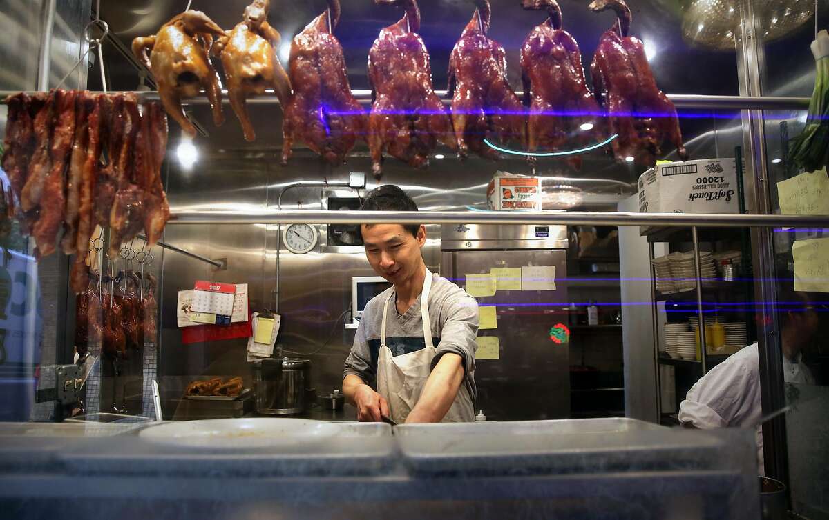 One of the cooks working at the popular New Asia restaurant in Chinatown in San Francisco, Calif., on Tuesday April 26, 2017. The city of San Francisco is in contract to purchase the property and build affordable housing, with a new New Asia restaurant downstairs.