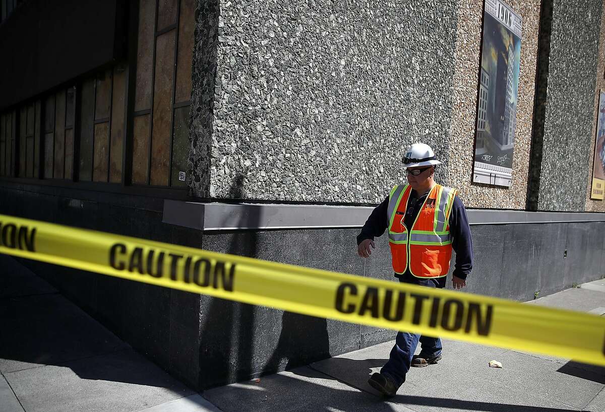 SAN FRANCISCO, CA - APRIL 21: A Pacific Gas and Electric (PG&E) worker walks outside of an electric substation where a fire occured and caused a citywide power outage on April 21, 2017 in San Francisco, California. Nearly 100,000 Pacific Gas and Electric (PG&E) customers in San Francisco are without power due to a fire at a PG&E substation. Street lights and public transportation that is powered by electricity are also out of service. (Photo by Justin Sullivan/Getty Images)