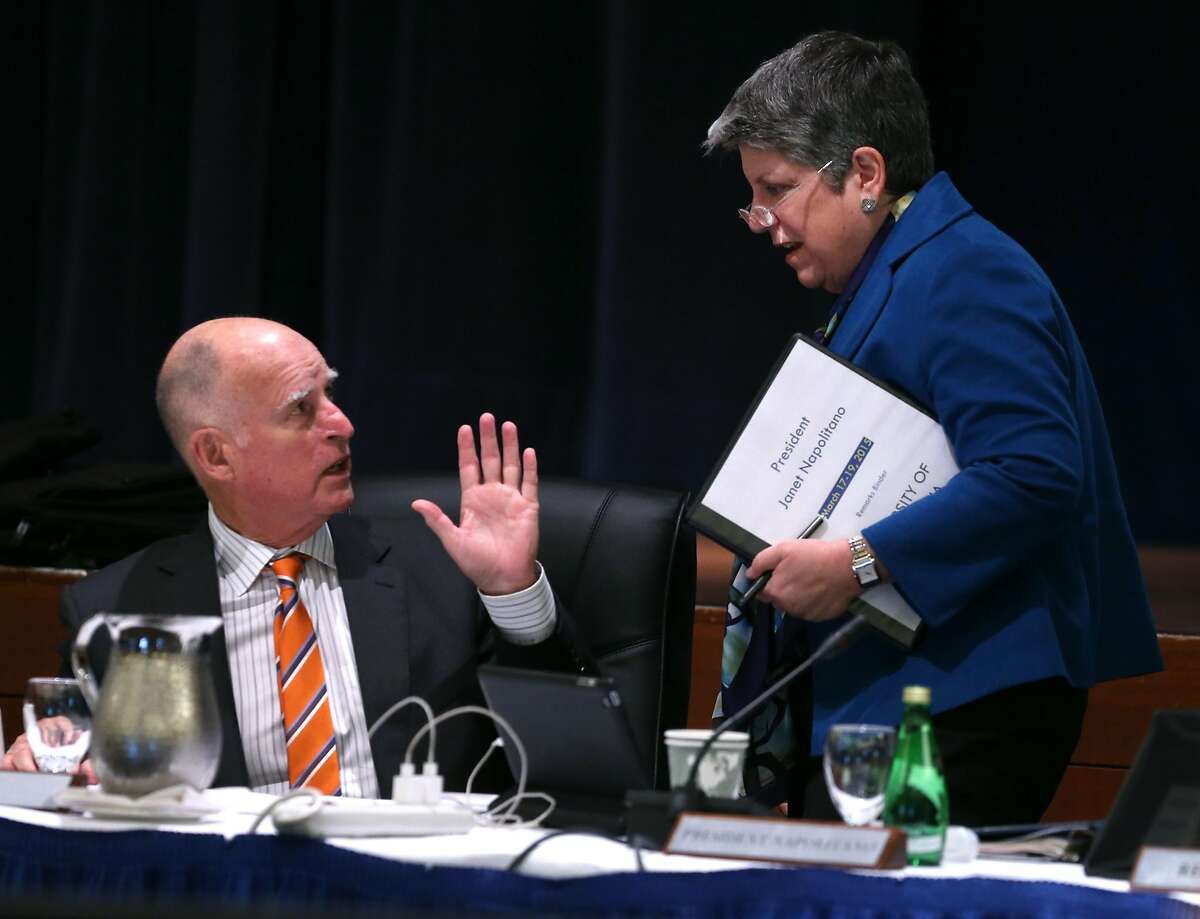 Gov. Jerry Brown waves to UC President Janet Napolitano after Brown arrived to attend the University of California Board of Regents meeting at the UCSF Mission Bay campus in San Francisco, Calif. on Wednesday, March 18, 2015.