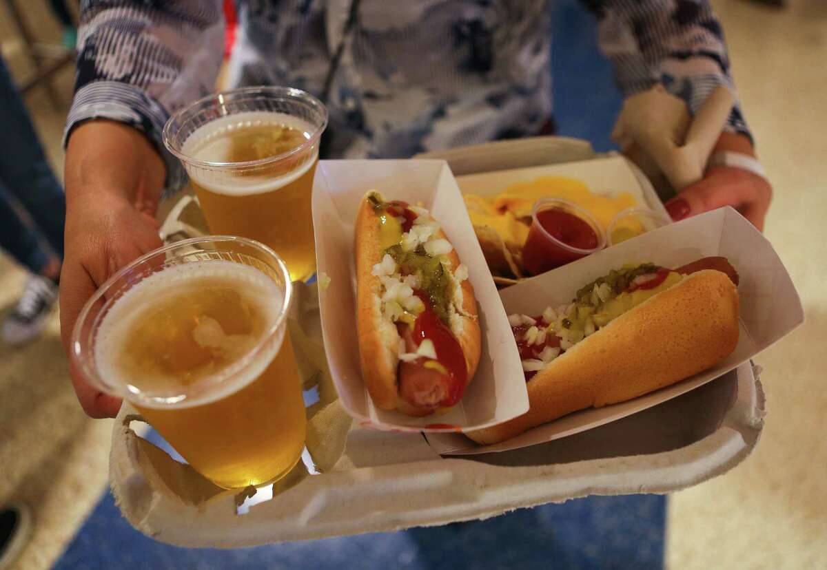 Dollar beers and hot dogs welcome fans to Toyota Center for Game 5 of the Rockets game against the Oklahoma City Thunder, Tuesday, April 24, 2017, in Houston.