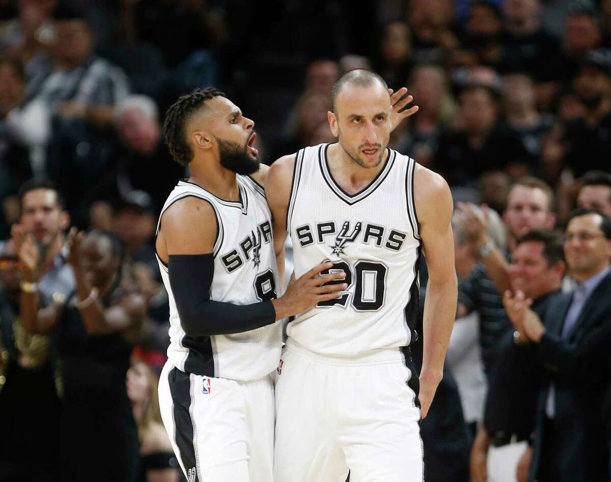 SAN ANTONIO,TX - APRIL 25 : Patty Mills #8 of the San Antonio Spurs congratulates Manu Ginobili #20 of the San Antonio Spurs after a defensive effort against the Memphis Grizzlies in Game Five of the Western Conference Quarterfinals during the 2017 NBA Playoffs at AT&T Center on April 25, 2017 in San Antonio, Texas. NOTE TO USER: User expressly acknowledges and agrees that , by downloading and or using this photograph, User is consenting to the terms and conditions of the Getty Images License Agreement.