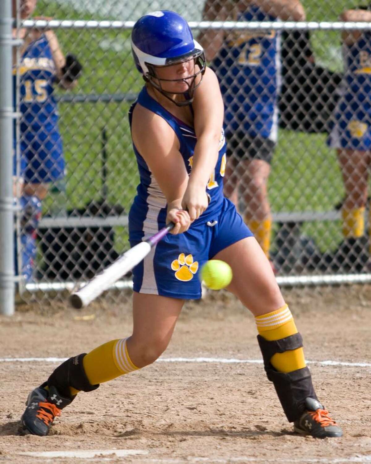 Brookfield's Stephanie Moss slugs a triple which drove in the Bobcats' lone two runs in a 2-1 State Class L tournament quarterfinal win over Windsor Friday at Brookfield High.