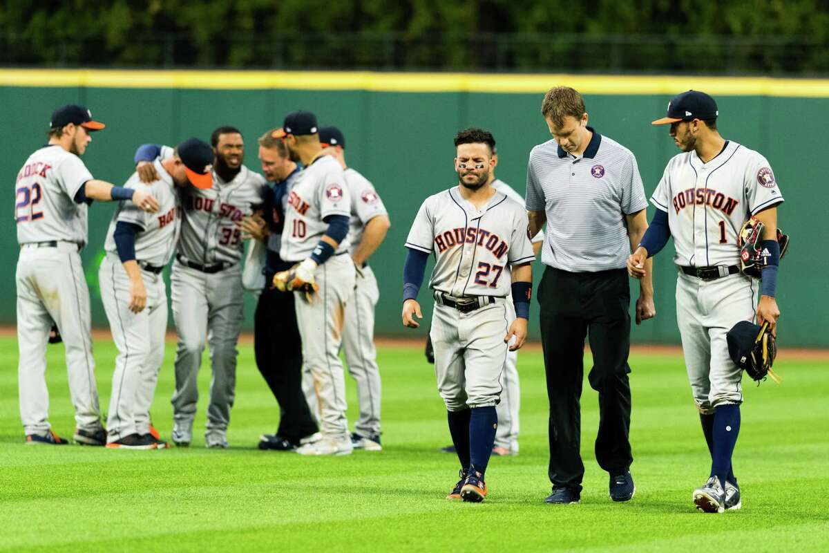 Houston Astros' George Springer catches a fly ball hit by New York