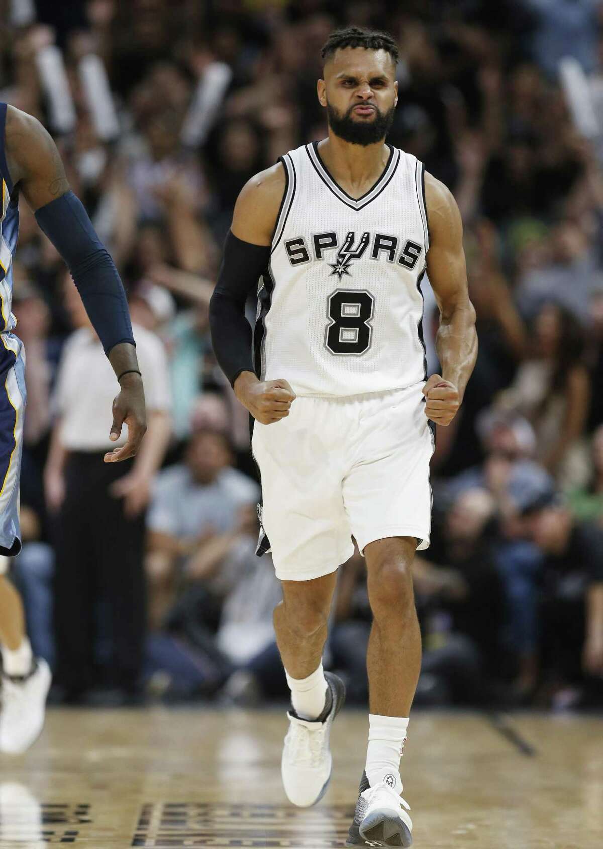 Spurs' Patty Mills (08) reacts after hitting a three-pointer against the Memphis Grizzlies during Game 5 of the Western Conference playoffs at the AT&T Center on Tuesday, Apr. 25, 2017. Spurs take Game 5, 116-103, over the Grizzlies. (Kin Man Hui/San Antonio Express-News)