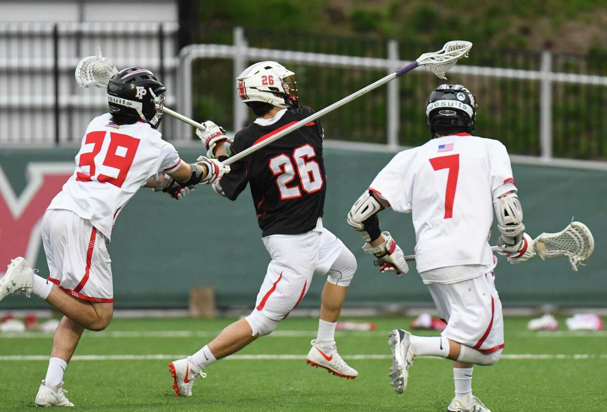 Ryan O'Connell (26) of the New Canaan Rams shoots during a game against the Fairfield Prep Jesuits at Fairfield University on April 22, 2017 in Fairfield, Connecticut.