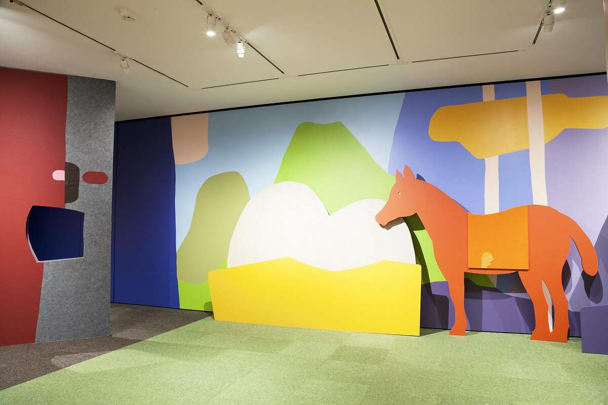 A family activity room takes a central place in "Of Dogs and Other People: The Art of Roy De Forest" at the Oakland Museum of California.