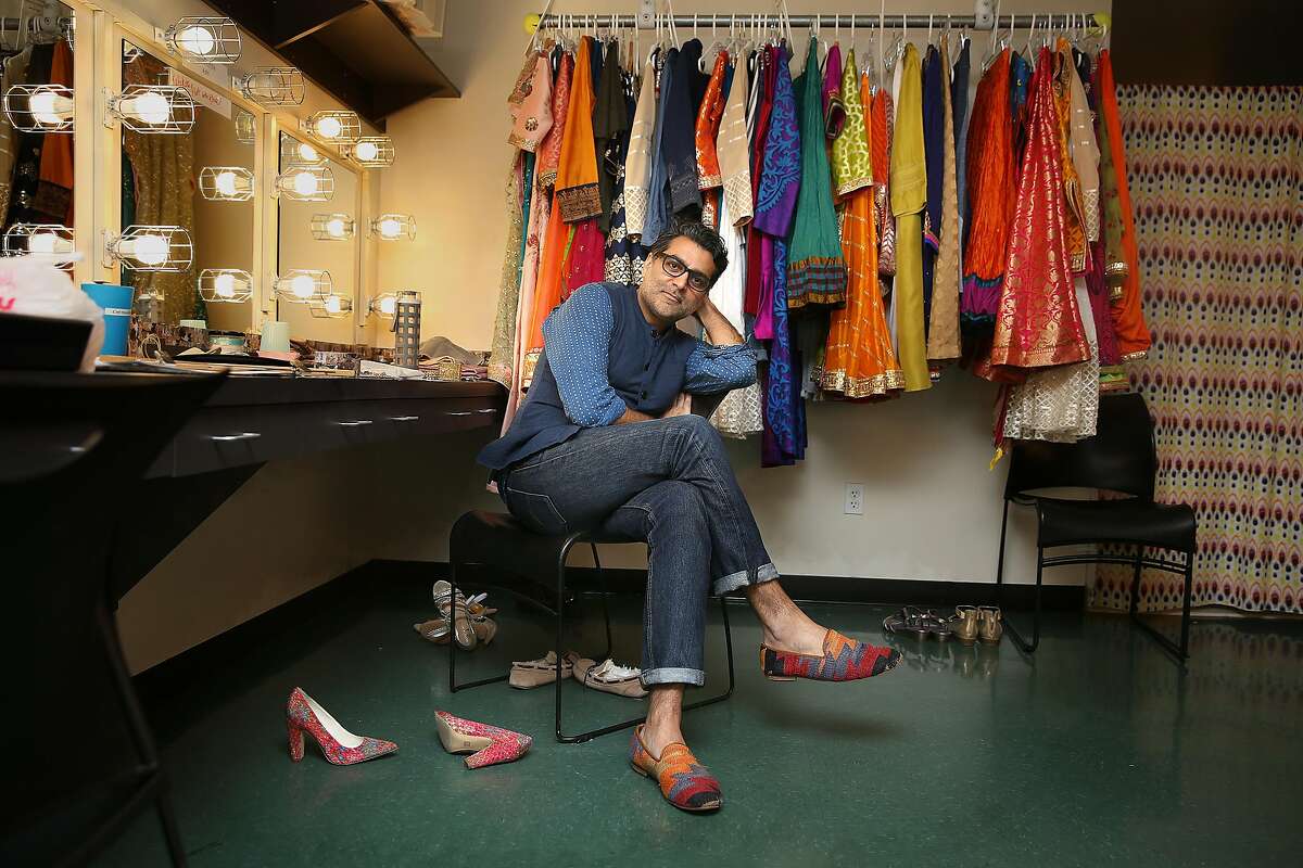 Costume designer Arjun Bhasin in the dressing room with some of his costumes for the new musical 'Monsoon Wedding' at the Berkeley Rep on Tuesday, April 25, 2017, in Berkeley, Calif.