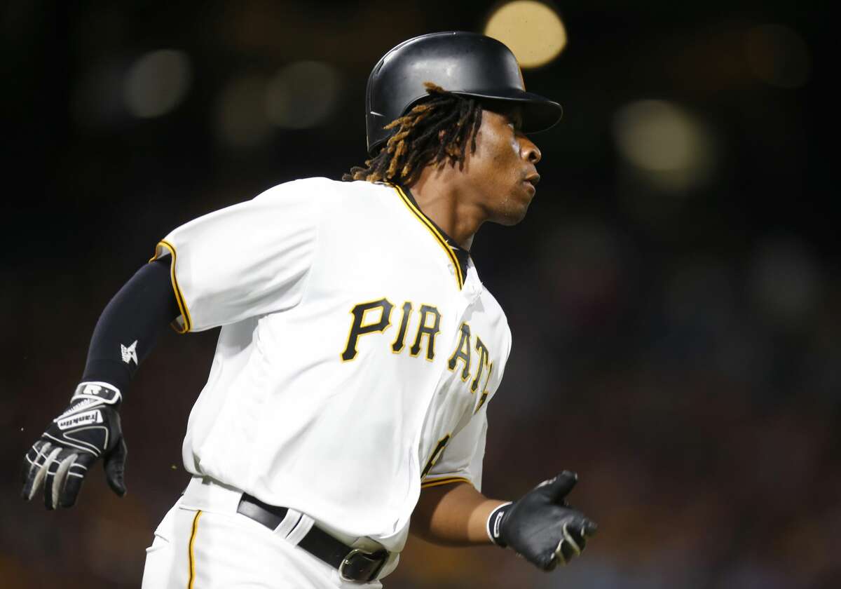 Gift Ngoepe, MLB's first Africanborn player, singles in first atbat