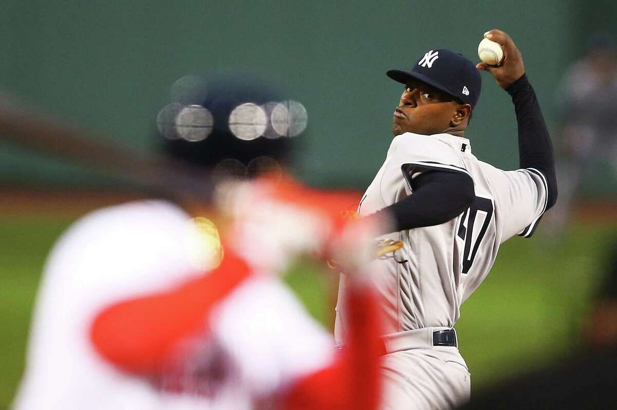 BOSTON, MA - APRIL 26: Luis Severino #40 of the New York Yankees delivers in the first inning during a game against the Boston Red Sox at Fenway Park on April 26, 2017 in Boston, Massachusetts. (Photo by Adam Glanzman/Getty Images) ORG XMIT: 700010546