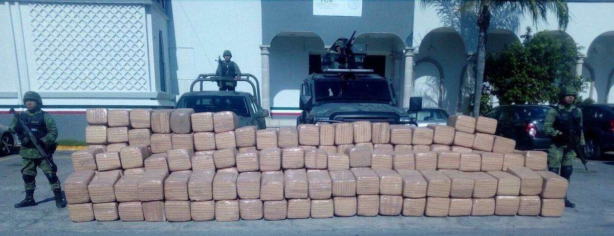 Mexican soldiers posed for a photo with the 2 tons of marijuana they seized Monday. Keep clicking through to see the biggest drug busts at the Texas-Mexico border.