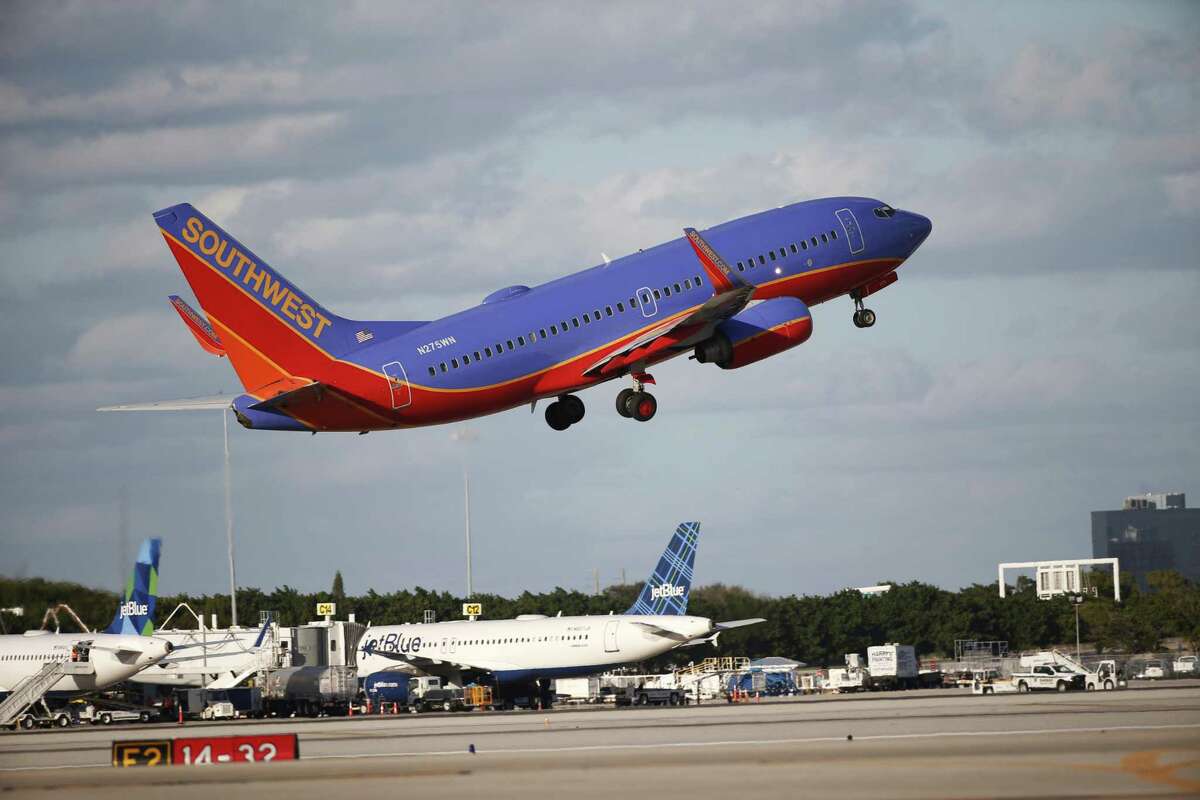 Southwest Airlines’ first-quarter earnings fell 32 percent as it flew more passengers but took in less revenue on average from each one. Rising costs for fuel and labor weighed on the airline.