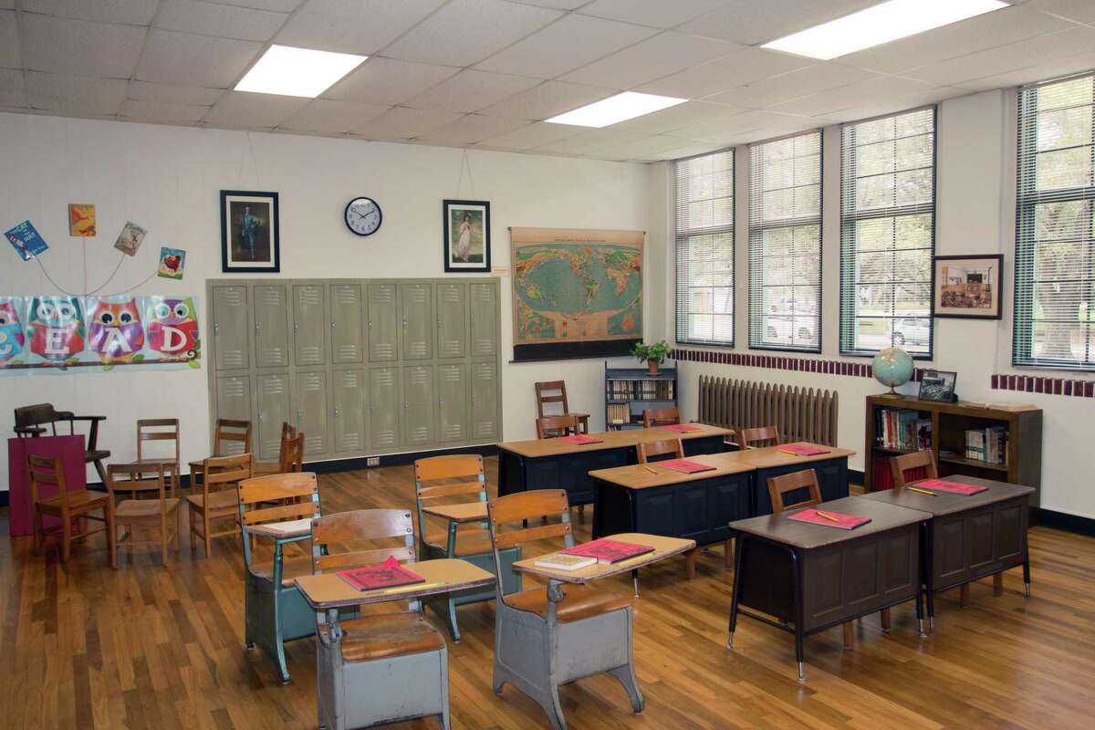 A vintage classroom setting is preserved at the Friendswood Schools Museum.