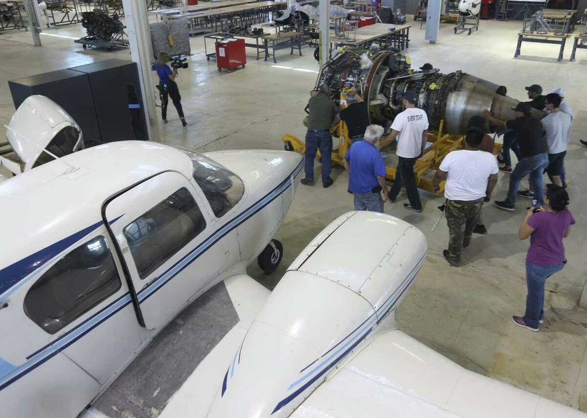 Faculty, students and staff help move a $7 million turbo fan jet engine, donated by Southwest Airlines, shortly after its arrival May 26, 2017 at the St. Philips College Southwest campus. The engine, now the largest engine in the college's aviation technology program, came off one of the airline's 737 airplanes after it had reached its service life.