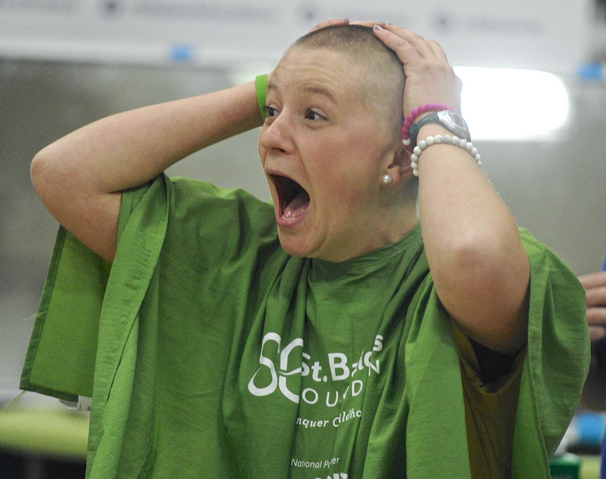 High schoolers lose locks, fight cancer