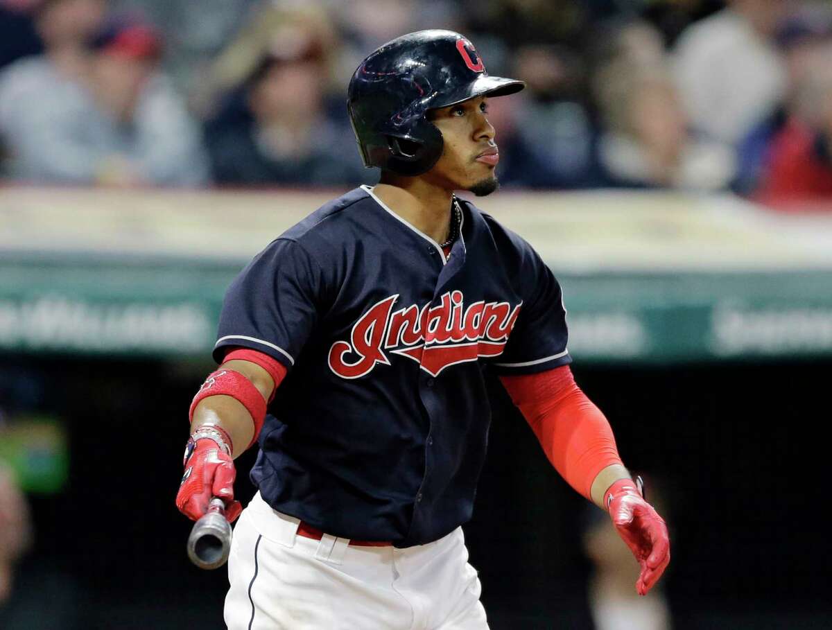 Cleveland Indians' Francisco Lindor watches his two-run home run off Houston Astros relief pitcher Chris Devenski during the seventh inning of a baseball game, Thursday, April 27, 2017, in Cleveland. (AP Photo/Tony Dejak)