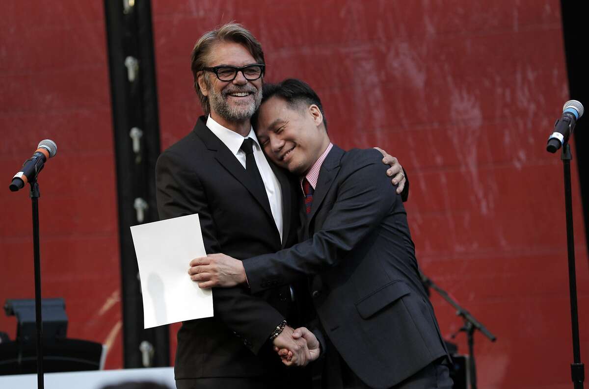 BD Wong hugs Harry Hamlin at the 50th anniversary gala for ACT at the Strand Theater in San Francisco, Calif., on Thursday, April 27, 2017. The star-studded event included VIPs from stage and screen honoring the