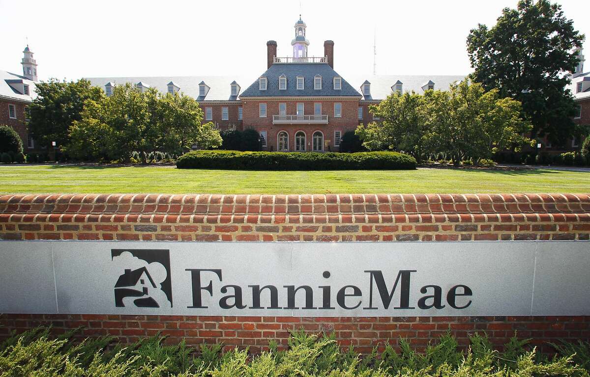 FILE - This Monday, Aug. 8, 2011, file photo, shows the Fannie Mae headquarters in Washington. Fannie Mae, the government-controlled mortgage company, said its net income in the fourth quarter nearly doubled on higher interest rates. It also said Friday, Feb. 19, 2016 that it expects to pay the U.S. Department of Treasury $2.9 billion in dividends next month.(AP Photo/Manuel Balce Ceneta)