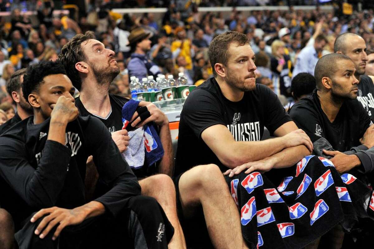 San Antonio Spurs, from left, Dejounte Murray, Pau Gasol, David Lee, Tony Parker, and Manu Ginobili sit on the bench during the second half against the Memphis Grizzlies in Game 3 in an NBA basketball first-round playoff series Thursday, April 20, 2017, in Memphis, Tenn.