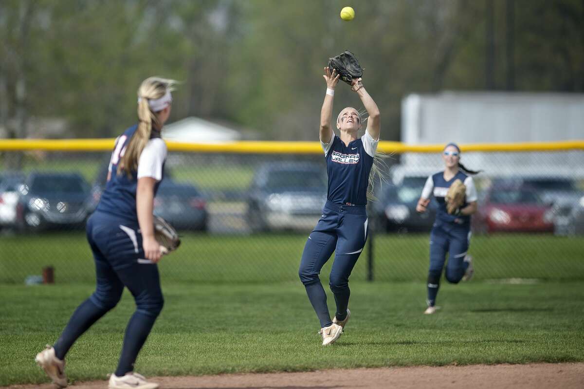 Saginaw Valley State University's Meredith Rousse catches a fly ball in the second inning of the Friday afternoon game against Northwood University in Kochville Township.
