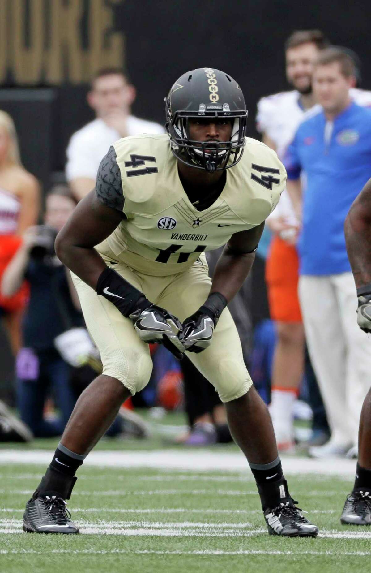 FILE - In this Oct. 1, 2016, file photo, Vanderbilt linebacker Zach Cunningham plays against Florida during an NCAA college football game in Nashville, Tenn. Cunningham has been among the nationÂ?’s most productive defensive players and earned first-team AP All-America honors after making 119 tackles, including 16Â½ for a loss. Vanderbilt plays North Carolina State in the Independence Bowl on Monday. (AP Photo/Mark Humphrey, File)