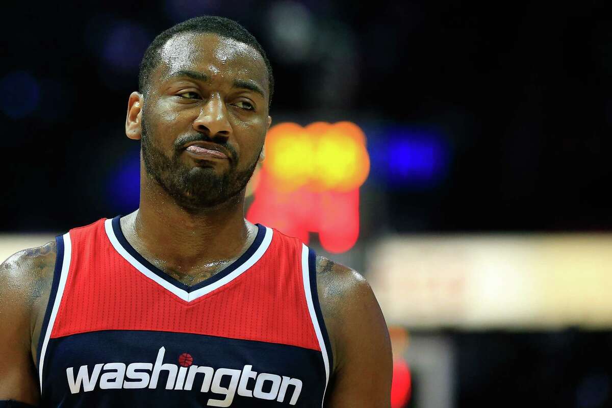 ATLANTA, GA - APRIL 24: John Wall #2 of the Washington Wizards reacts to a play during the first quarter against the Atlanta Hawks in Game Four of the Eastern Conference Quarterfinals during the 2017 NBA Playoffs at Philips Arena on April 24, 2017 in Atlanta, Georgia. NOTE TO USER: User expressly acknowledges and agrees that, by downloading and or using the photograph, User is consenting to the terms and conditions of the Getty Images License Agreement. (Photo by Daniel Shirey/Getty Images) ORG XMIT: 700034587