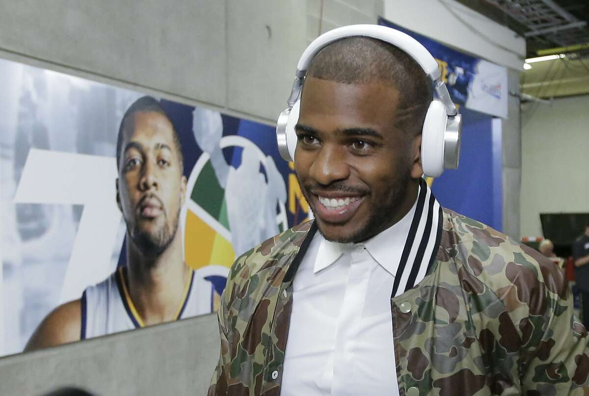 Los Angeles Clippers guard Chris Paul arrives for Game 6 of an NBA basketball first-round playoff series against the Utah Jazz Friday, April 28, 2017, in Salt Lake City. (AP Photo/Rick Bowmer)