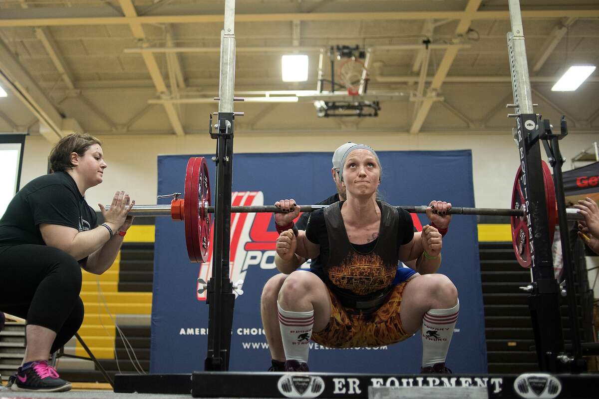 Jennifer McLane squats 281.1 pounds during the 2017 Spring Natural and Fit BarBellum powerlifting meet Saturday morning at Bullock Creek High School. This is the 3rd annual Spring Natural and Fit day with more than 400 athletes competing in powerlifting, Brazilian Jiu-Jitsu, the pull a truck and the annual Michigan ROAR Natural Bodybuilding Championship.