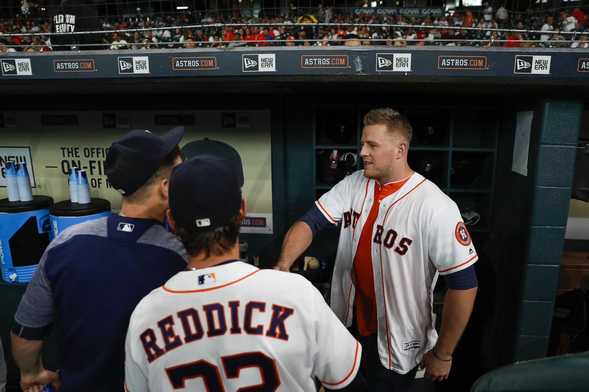 📸  Texans Rookies Throw Out First Pitch for the Houston Astros