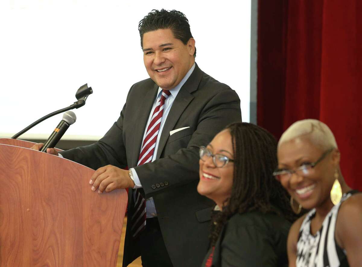 Richard Carranza, the Houston Independent School District's new superintendent, answers questions from the third ward community during a meeting at Blackshear Elementary School Saturday, Oct. 8, 2016, in Houston. Blackshear Elementary School Principal Alicia Lewis, left, and HISD trustee Jolanda Jones were also at the meeting. (Yi-Chin Lee / Houston Chronicle )