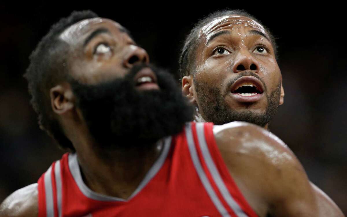 Houston RocketsÃ©?• James Harden and San Antonio Spurs' Kawhi Leonard struggle for position on a free throw during first half action Monday March 6, 2017 at the AT&T Center.
