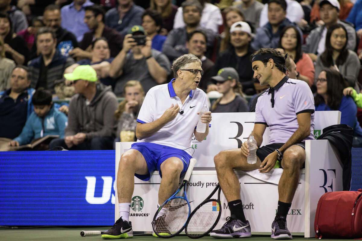 Bill Gates and Roger Federer converse between games during The Match for Africa 4 at KeyArena on Saturday, April 29, 2017. Proceeds of the match benefit the Roger Federer Foundation and its projects to help children in poverty.