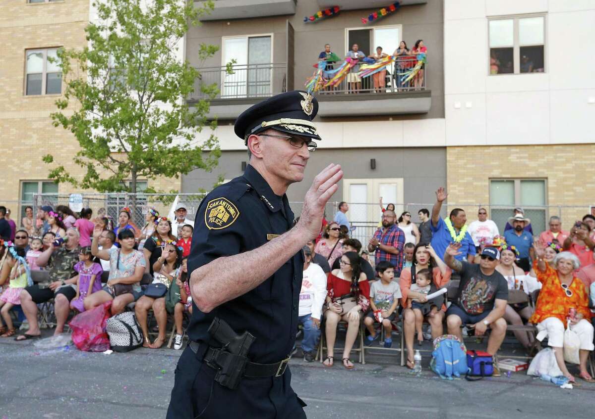 San Antonio Police Chief William McManus waves during the 2017 Fiesta Flambeau Parade Saturday April 29, 2017.