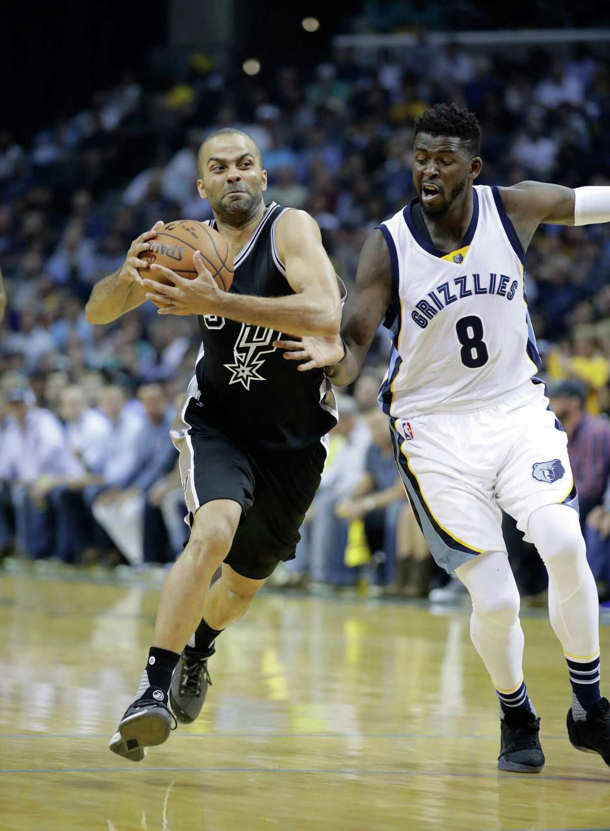 Spurs’ Tony Parker drives past the Grizzlies’ James Ennis during Game 3 at the FedEx Forum on April 20, 2017 in Memphis, Tenn.
