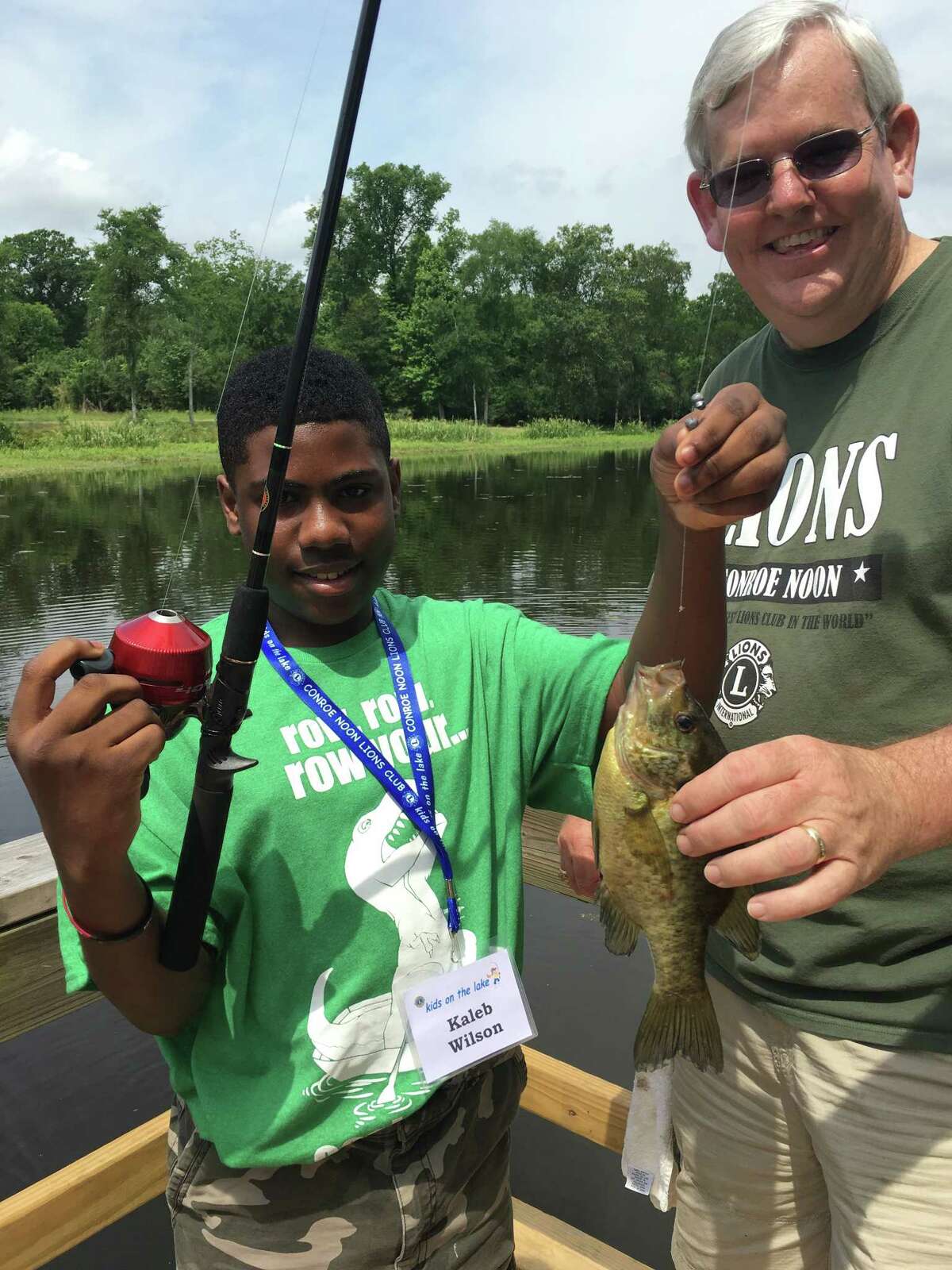 Conroe Noon Lions Club will host its annual 'kids on the lake' – fishing tournament for special needs children on Saturday, May 13th at the Conroe YMCA's Camp Owen – registrations due by May 10th. Pictured from left are Kaleb Wilson and Lion George Waggoner.