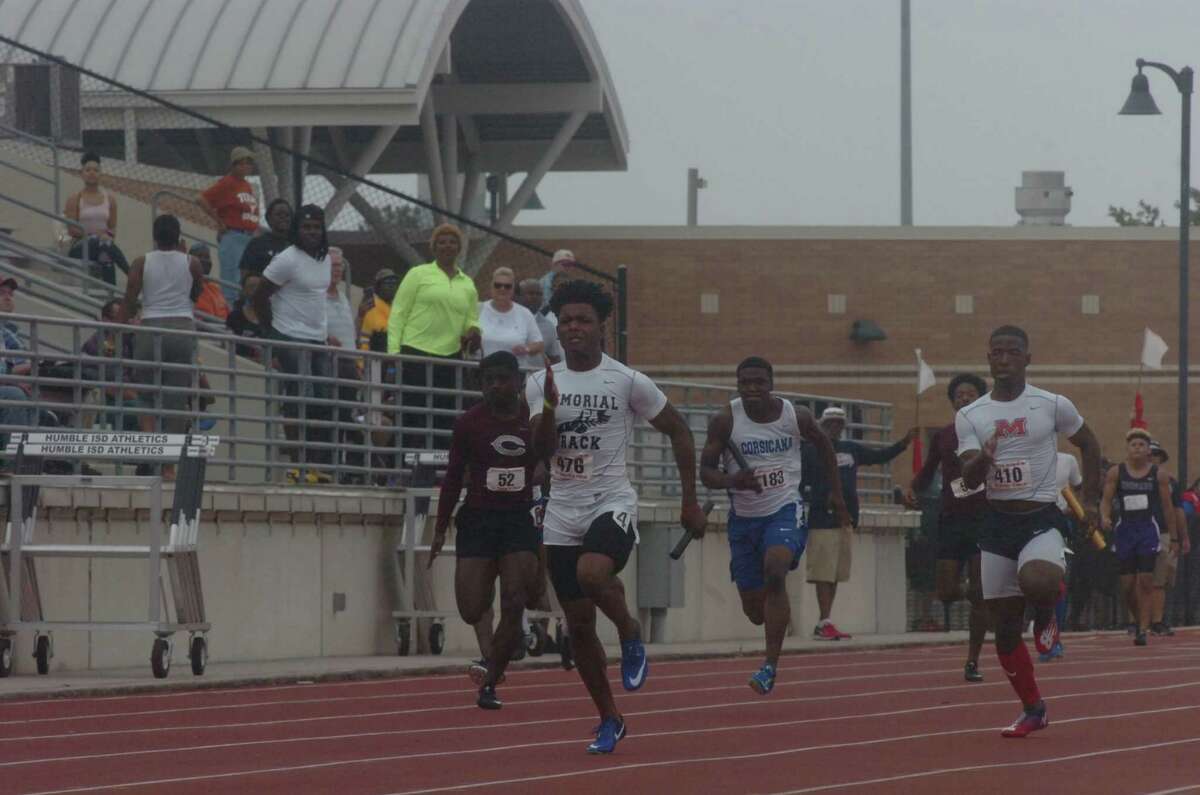 Port Arthur Memorial's DeAndre Angelle runs during the boys 4x100 meter relay on Saturday at Turner Stadium in Humble.
