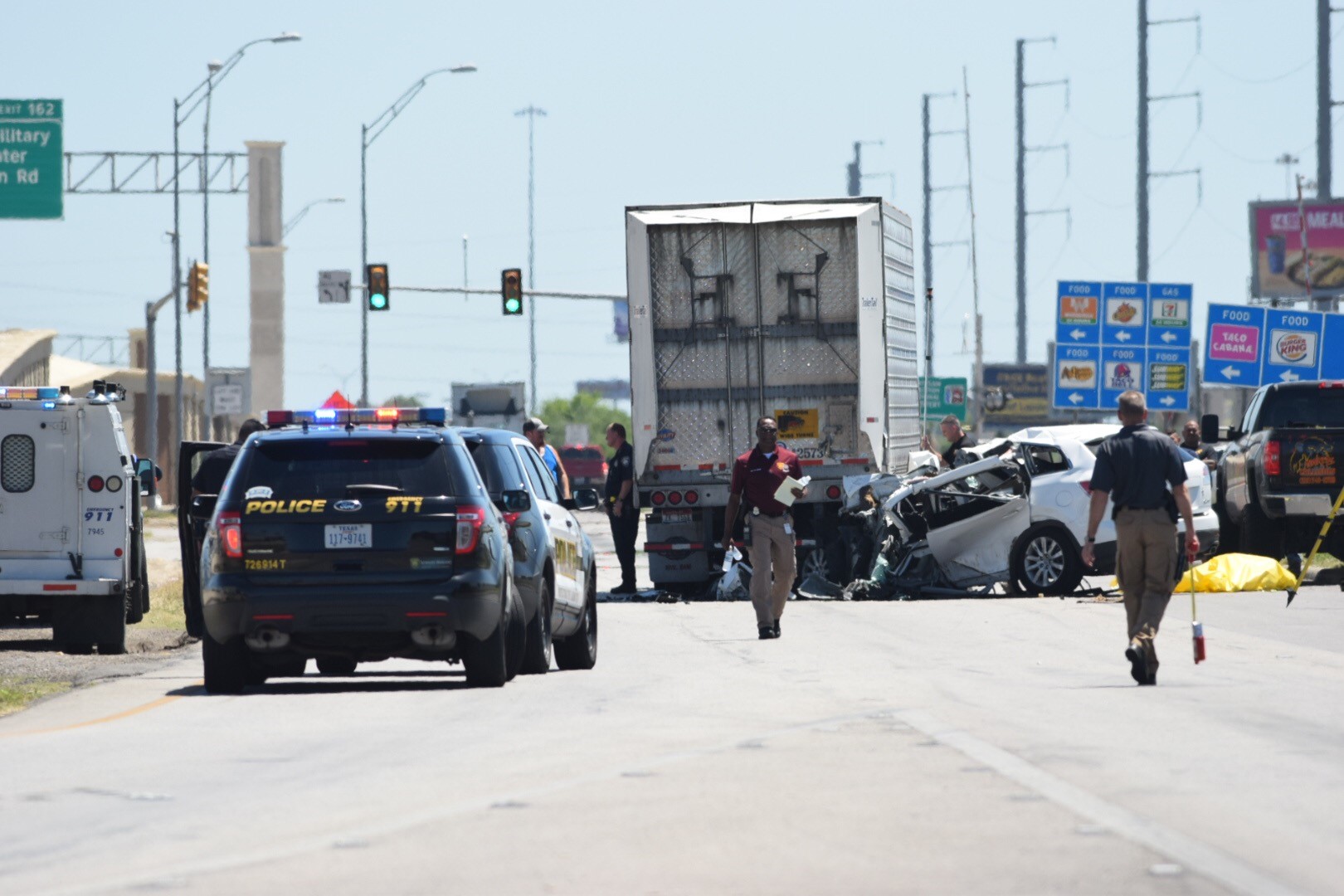 Woman killed in crash with 18-wheeler on I-35 access road