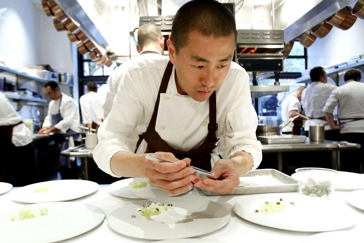 Chef Corey Lee of Benu plates a dish at the Chronicle's 4-Star Chef Dinner at Quince in San Francisco, Calif., Sunday, July 29, 2012. The event raised money for the San Francisco/Marin Food Bank.