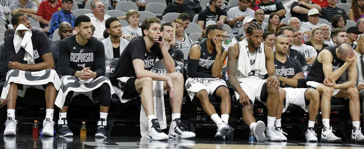 San Antonio Spurs' LaMarcus Aldridge (from left), Danny Green, Pau Gasol, Patty Mills, Kawhi Leonard, Tony Parker, and Manu Ginobili sit dejected on the bench during second half action of Game 1 in the Western Conference semifinals against the Houston Rockets held Monday May 1, 2017 at the AT&T Center.
