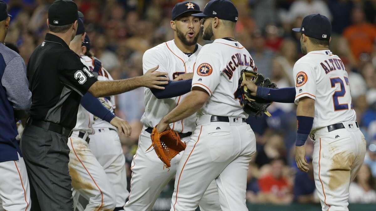 Benches clear in Rangers-Astros game after Mike Napoli watches one go  behind his back