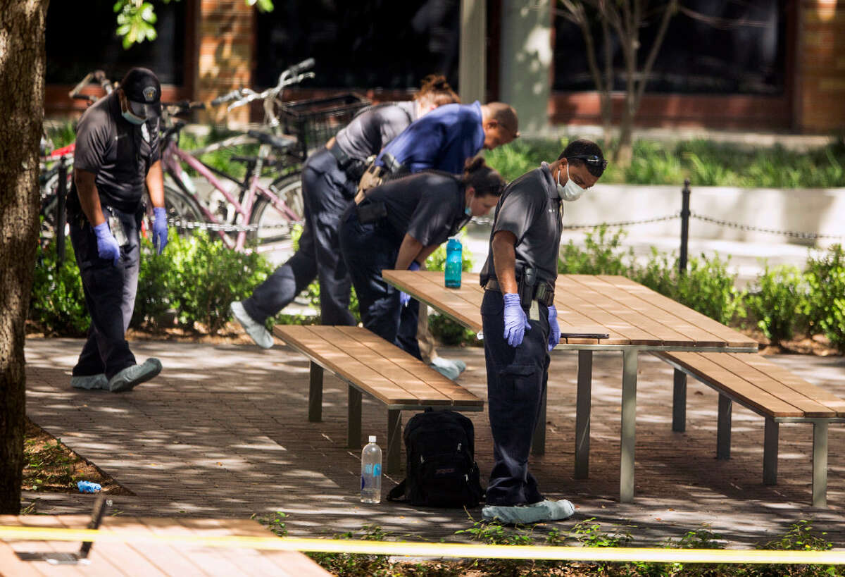 Officials investigate after a fatal stabbing attack at the University of Texas campus on Monday.