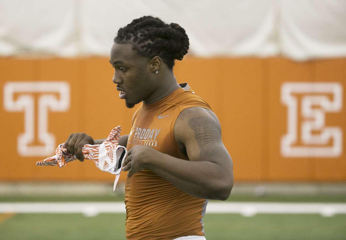 Texas RB D'Onta Foreman goes through agility drills as he performed for NFL scouts Tuesday March 28, 2017 during Pro Timing Day at the University inside the team practice bubble. RALPH BARRERA/AMERICAN-STATESMAN