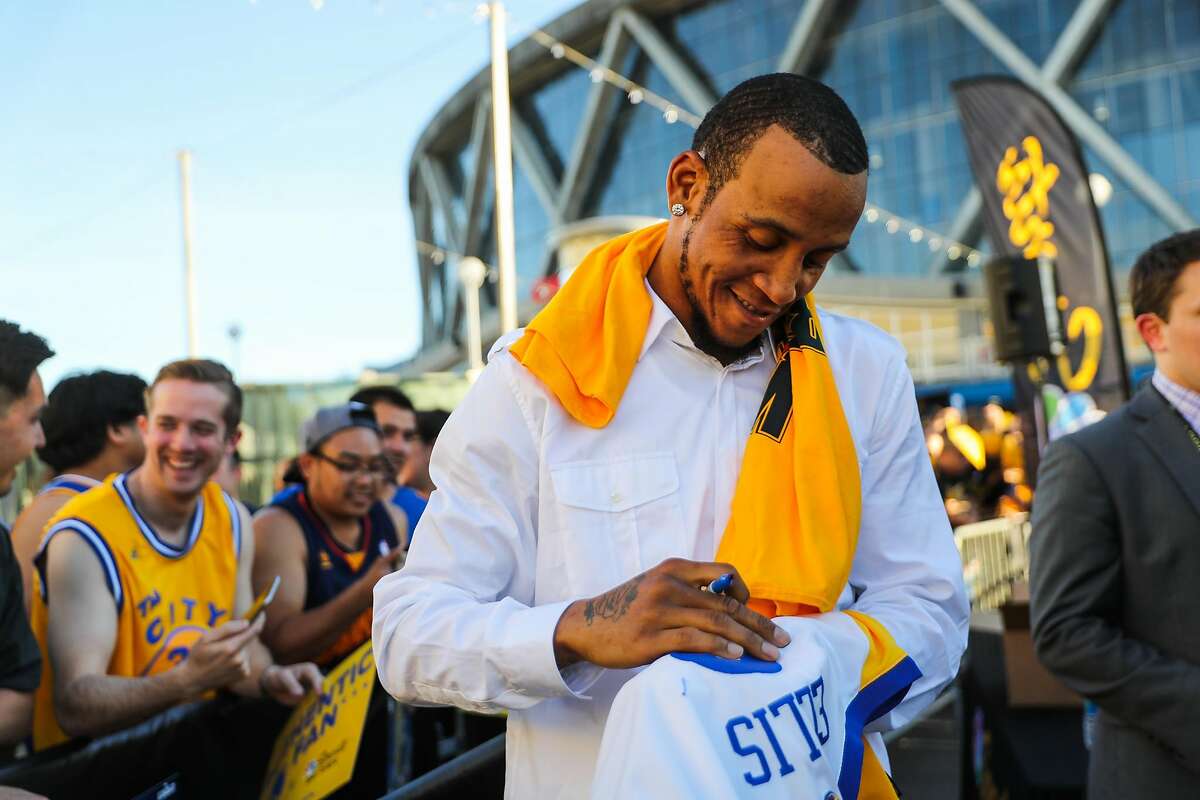 FILE - Former Golden State Warriors player Monta Ellis signs autographs for fans ahead of Game 1 of the Western Conference Semifinals 2017 NBA playoffs between the Golden State Warriors and Utah Jazz at Oracle Arena in Oakland, California, on Tuesday, May 2, 2017.
