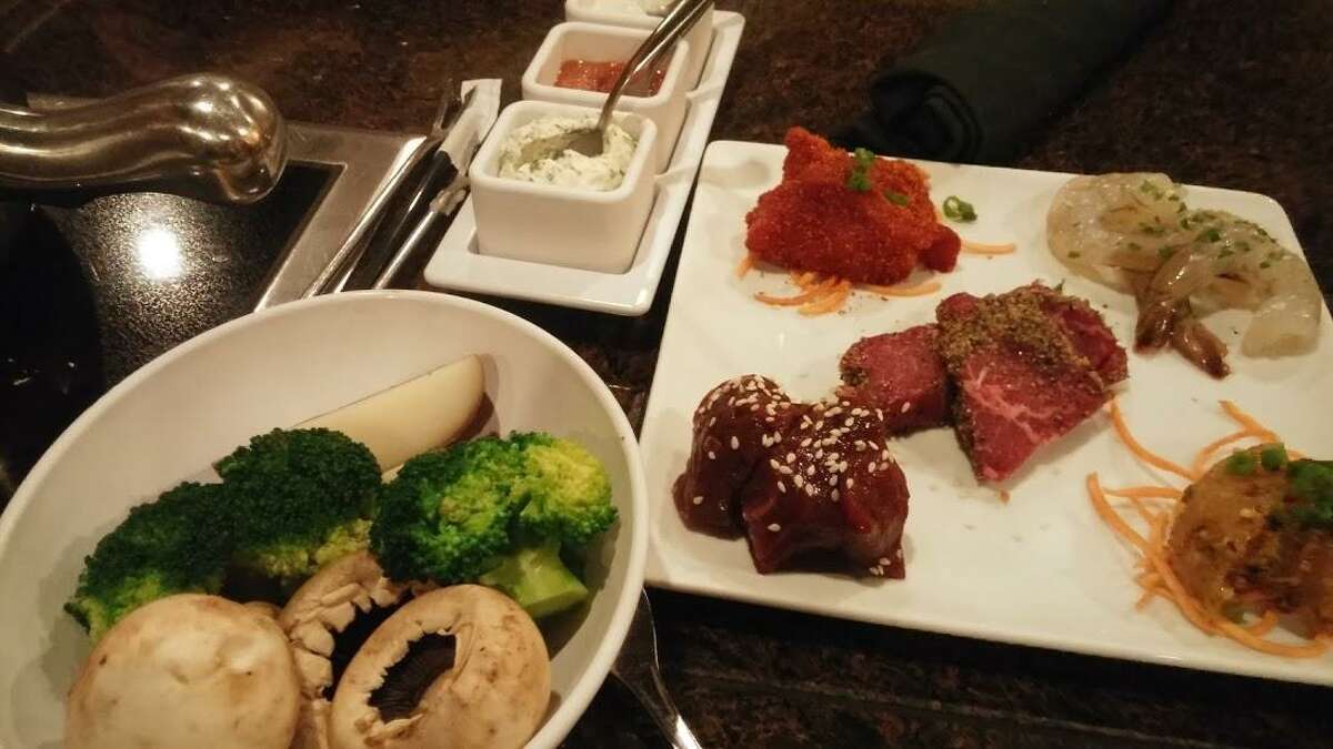 At the Melting Pot in Darien, fondue is on the menu for starter, main course, and dessert. You do the cooking and have the fun. The drudgery of preparation and cleanup is done for you.