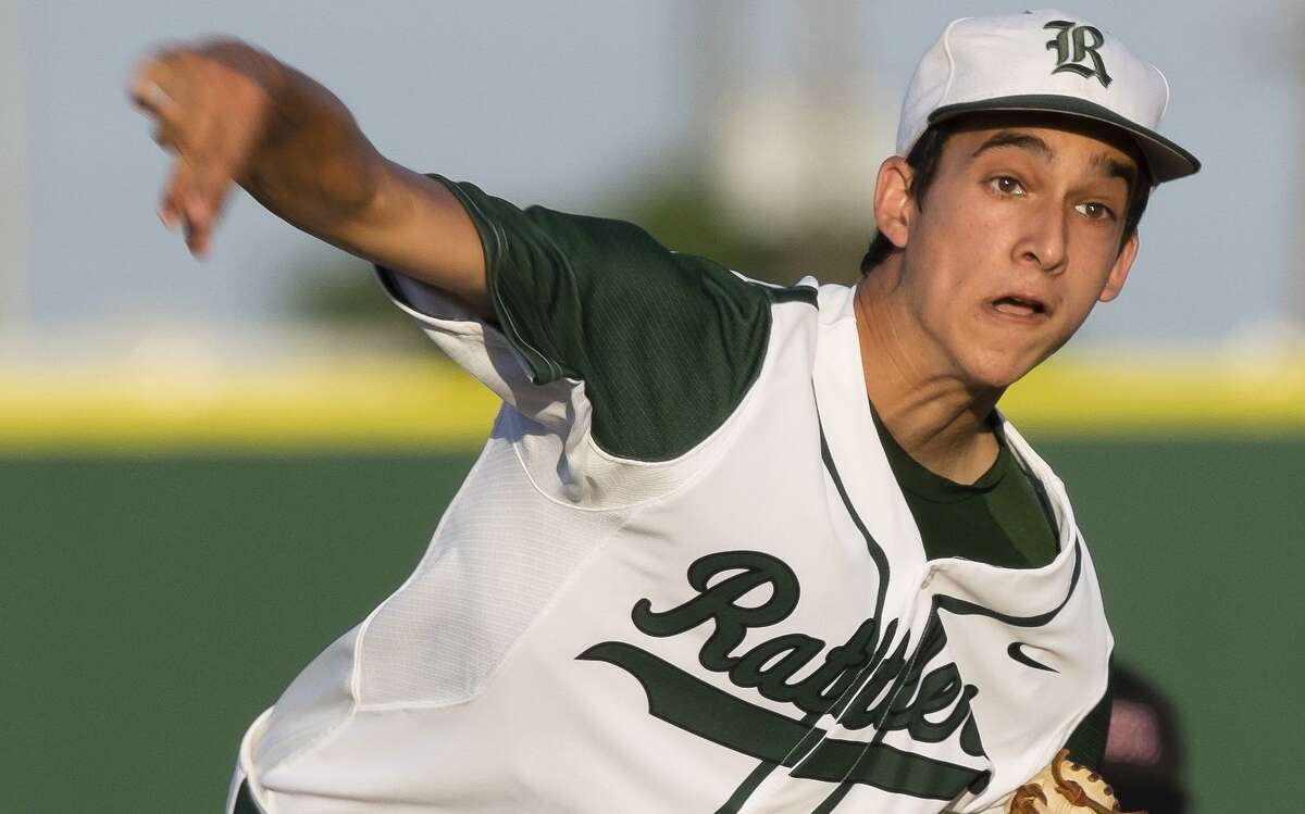 Reagan’s Troy Montemayor pitches against Churchill on April 22, 2014, at Blossom Athleti Center in San Antonio.