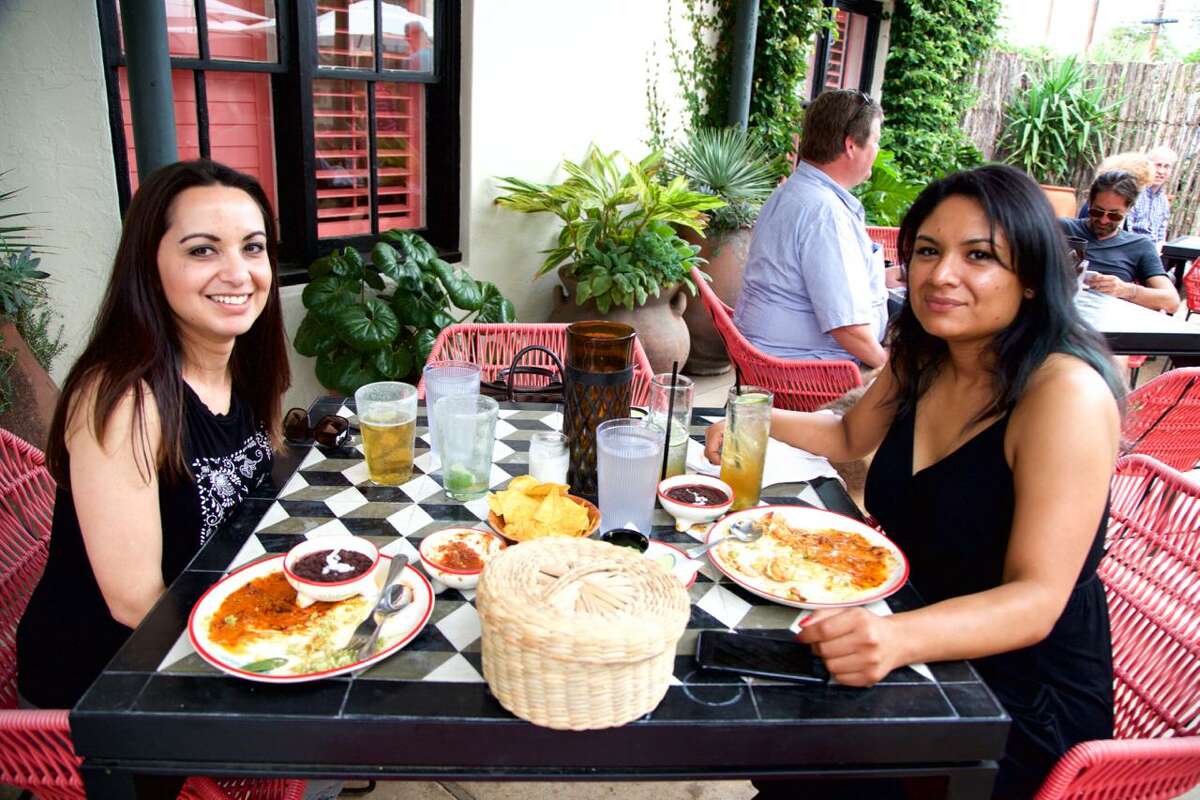 Jackie Davila and Bevenice Rodriguez enjoy the patio at El Mirador.