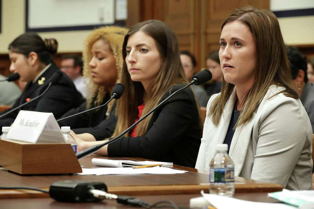WASHINGTON, DC - MAY 02: Former U.S. Naval Academy Midshipman Annie Kendzior (R), testifies before the House Armed Services Committee's Subcommittee on Military Personnel with fellow sexual assault survivors (2nd R-L) former U.S. Military Academy cadets Stephanie Gross andAriana Bullard and Naval Academy Midshipman Second Class Shiela Craine in the Rayburn House Office Building on Capitol Hill May 2, 2017 in Washington, DC. Recruited as a student athelete, Kendzior was twice raped after enrolling at the Naval Academy in 2008. After reporting the crime she said the superintendent at the time told her to "grow up." The academy superintendents were called to testify following the release of a survey last month by the Pentagon that said 12.2 percent of academy women and 1.7 percent of academy men reported experiencing unwanted sexual contact during the 2015-16 academic year. The number of reports at West Point increased from 17 to 26, while reports at the Naval Academy ticked up from 25 to 28 over the last academic year. (Photo by Chip Somodevilla/Getty Images)
