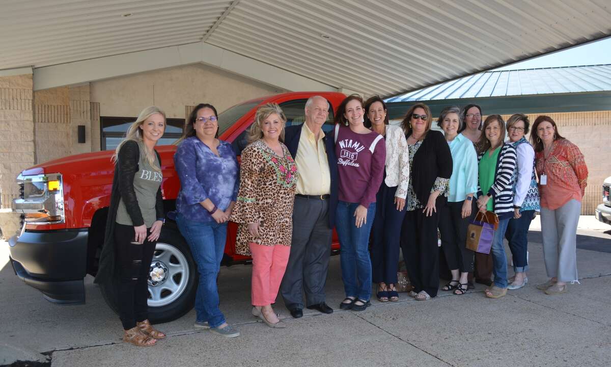 Representatives of Community Partners of the South Plains which operate the Rainbow Room to benefit children in foster care, surround David Wilder of P&E Leasing on Wednesday after he won the Rainbow Room’s annual truck raffle. The drawing for the 2017 Chevrolet Silverado was held during the Plainview Lions Club noon meeting at the Plainview Convention Center. Wilder’s late wife, Myrt, was a longtime Rainbow Room board member and former chairperson of its truck raffle, which serves as the organization’s primary fundraiser each year.